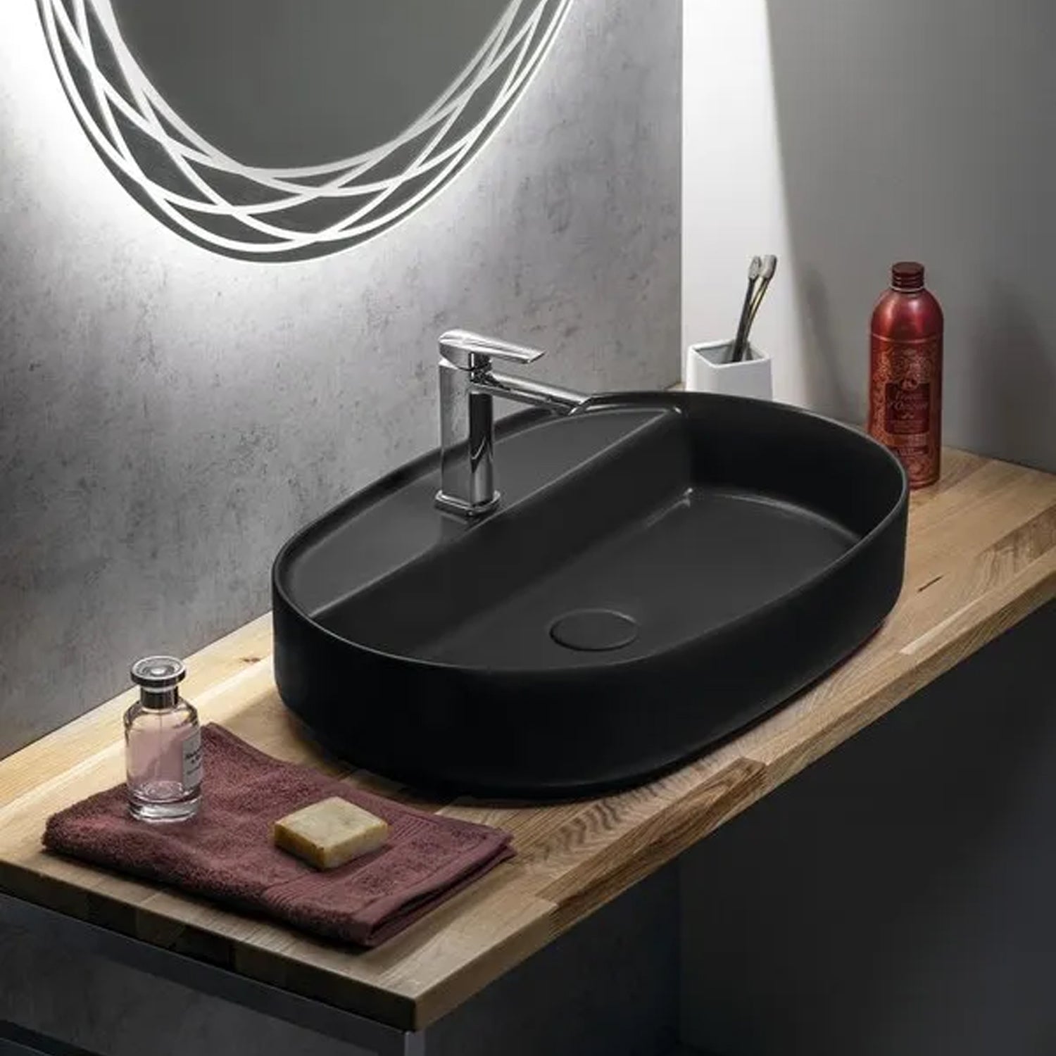 Lavabo d'appoggio ovale con foro BathCore serie Infinity 60x40 color Nero Opaco