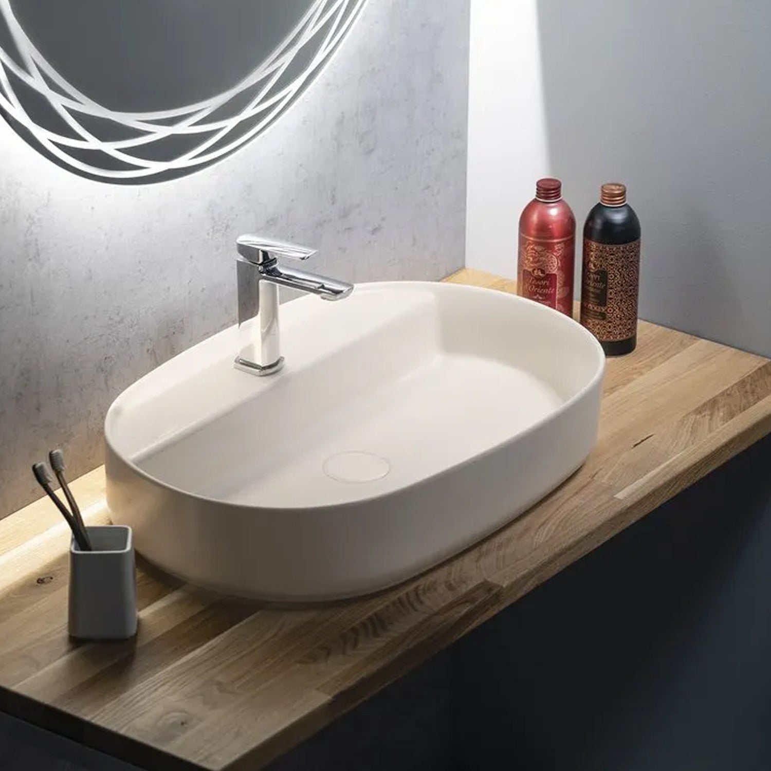 Lavabo d'appoggio ovale con foro BathCore serie Infinity 60x40 color Avorio Opaco
