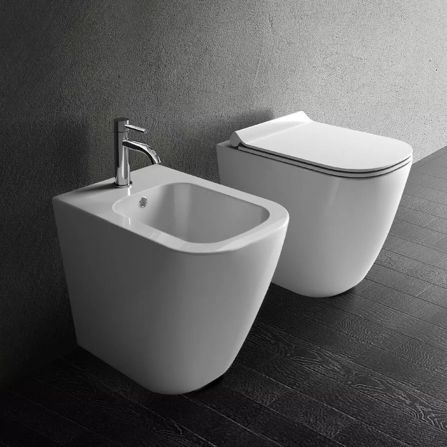 Coppia di sanitari filomuro 56x36 cm scarico traslato serie Dream di Ceramica Galassia con sedile soft close