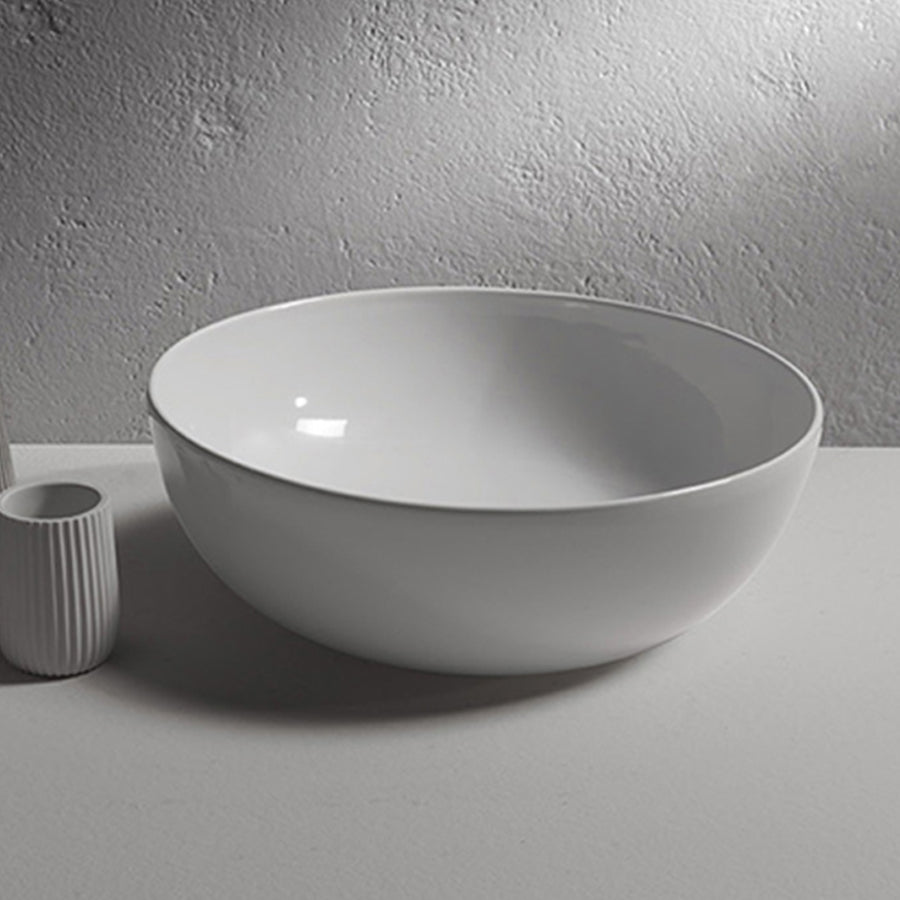Lavabo tondo diametro 30 cm altezza cm 16. Installazione da appoggio. In ceramica bianca