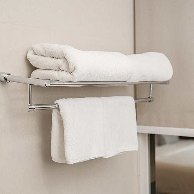 Portasciugamani a snodo o fisso? Ottimizzare le pareti del bagno