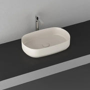 Lavabo d'appoggio ovale senza foro BathCore serie Infinity 55x36 color Avorio Opaco