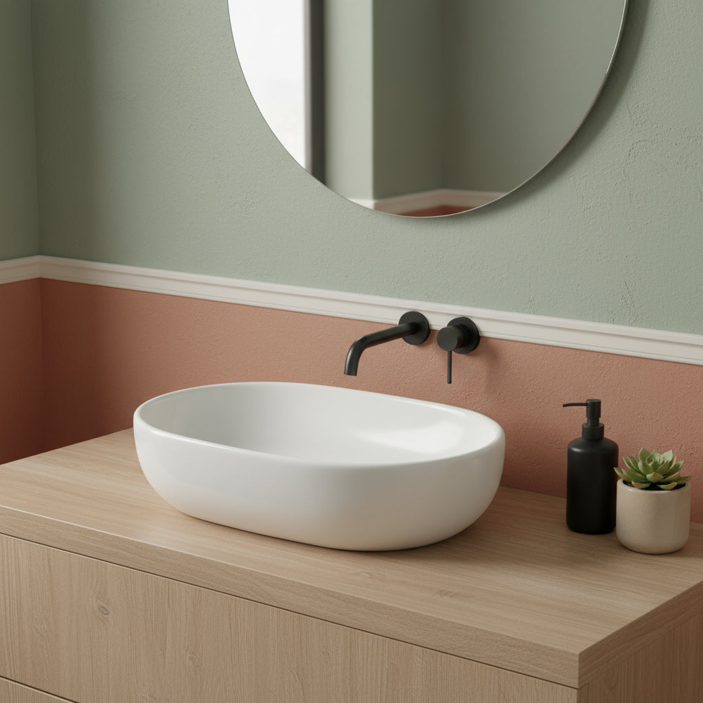 Lavabo da appoggio ovale in ceramica bianca 58x41 con bordo sottile