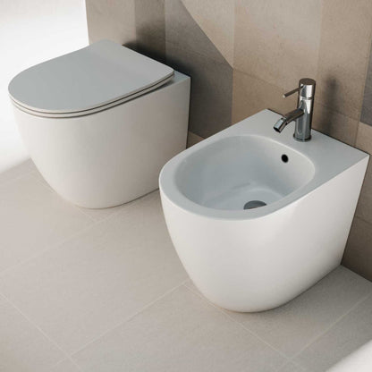 Sanitari filomuro senza brida con Copriwater Soft Close BathCore serie Aria 52x37 x H40.5 cm - Bianco Lucido