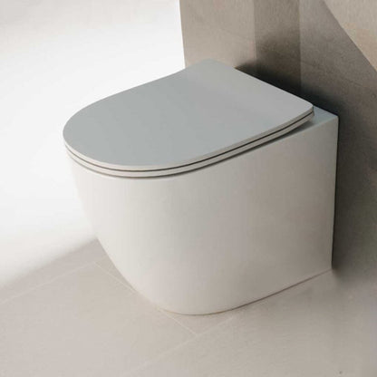 Vaso filomuro con Copriwater Soft Close BathCore serie Aria Special Traslato 56x36 x H42 cm - Bianco Lucido