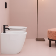 Sanitari Filomuro con scarico traslato collezione EVA wc senza brida + bidet + sedile soft close