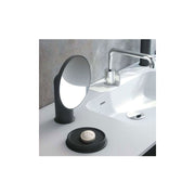 Specchio ingranditore da appoggio in acciaio della collezione 'Geyser' by Cosmic - Nero satinato by CeramicStore | Lo specialista del tuo bagno