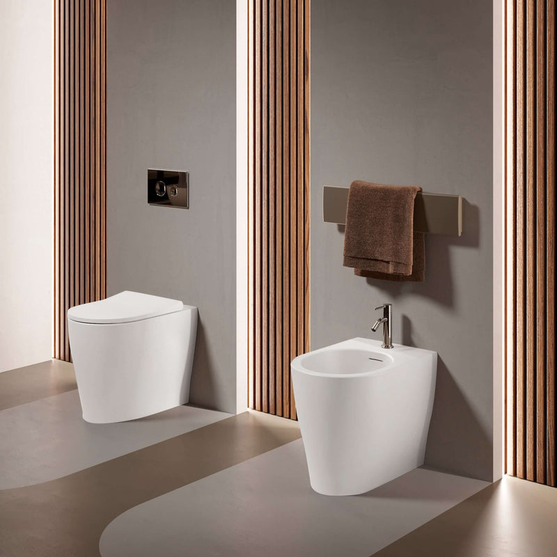 Sanitari filomuro senza brida scarico traslato Domus Falerii collezione Multipla 52x36 cm bianco lucido