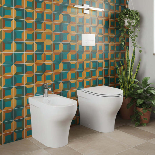 Sanitari filomuro Experience-bidet wc senza brida con scarico traslato e sedile tradizionale 54