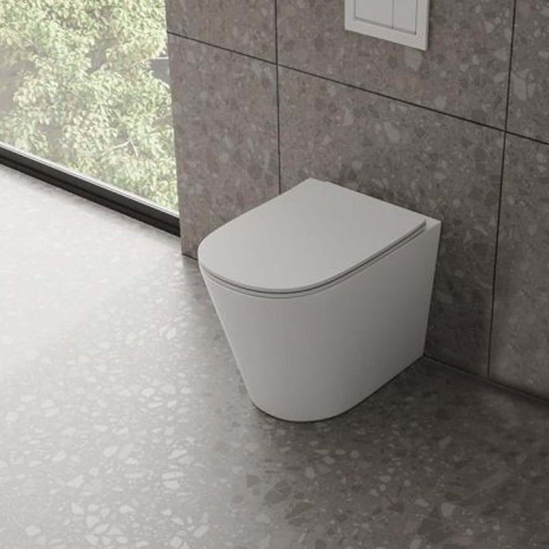 Sanitari filomuro senza brida con copriwater soft close BathCore serie Cuore L 37 x P 52 x H 41 cm â€“ Bianco lucido
