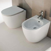 Sanitari filomuro senza brida con Copriwater Soft Close BathCore serie Aria 52x37 x H40.5 cm - Bianco Lucido