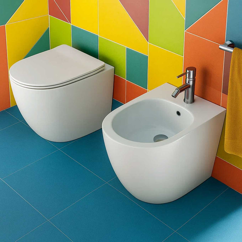 Sanitari filomuro 56x36 con Copriwater Soft Close BathCore serie Aria Special Traslato - Bianco Lucido