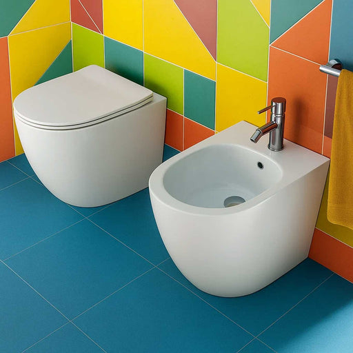 Sanitari filomuro 56x36 con Copriwater Soft Close BathCore serie Aria Special Traslato - Bianco Lucido