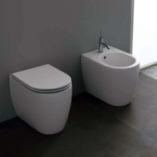 Santari filomuro serie Skip 55 in ceramica bianca con coprivaso chiusura tradizionale - Disegno Ceramica