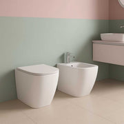 Sanitari filoparete con scarico Multi senza brida 50x36 cm modello Genesis Ceramica Globo - sedile soft close