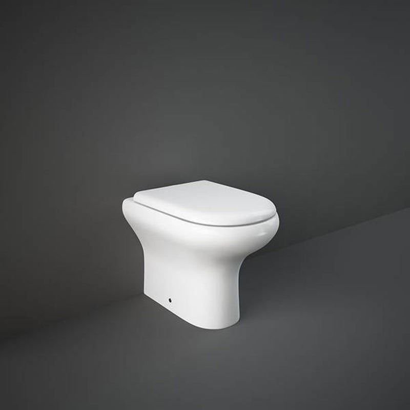 Sanitari filo muro moderni Rak Compact wc + bidet + sedile normal close in ceramica bianco lucido