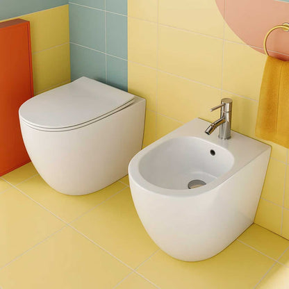 Sanitari filomuro BathCore serie Aria Special Traslato con Copriwater Soft Close 56x36 x H42 cm - Bianco Lucido