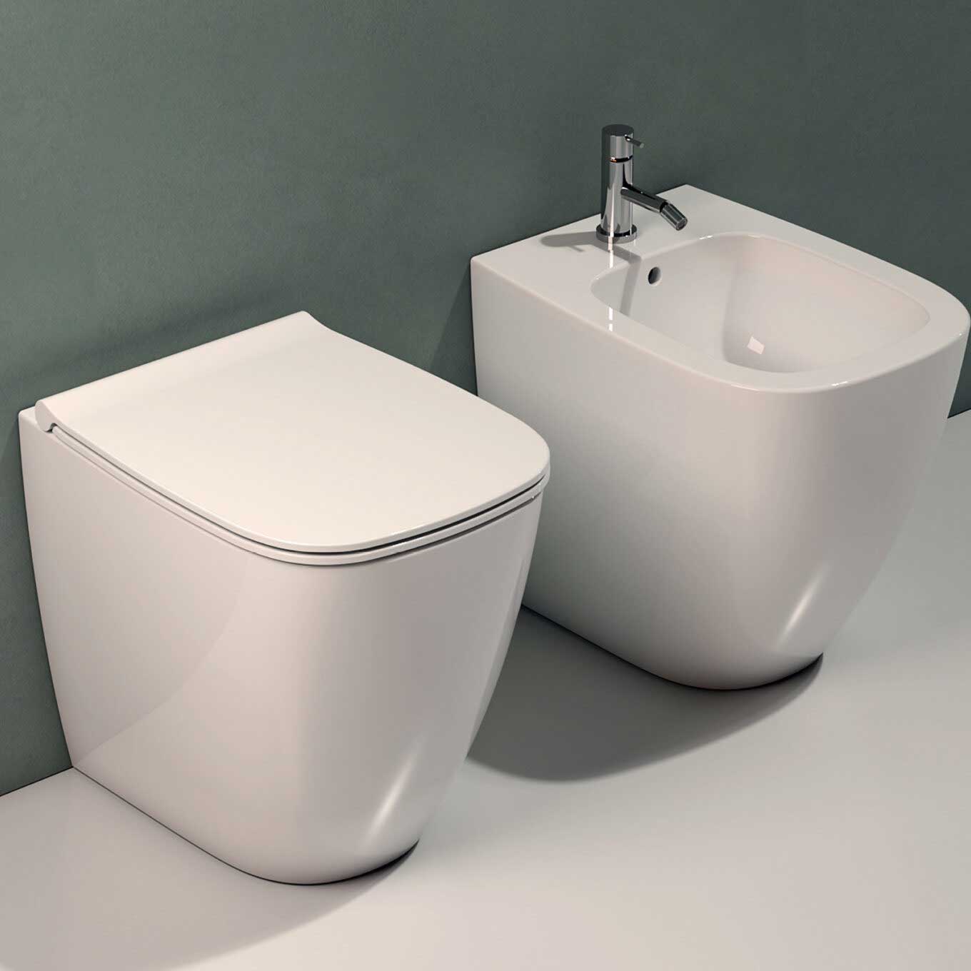 Sanitari filoparete senza brida con scarico traslato Ceramica Globo Genesis wc, bidet e sedile soft close